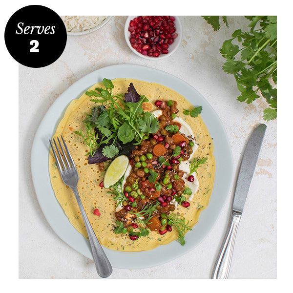 Rich Chana Masala on Coriander Pancakes with Garlic Coconut Yogurt